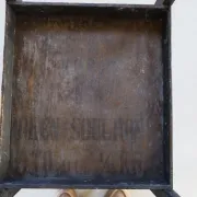 Decorated antique side table with elephant
