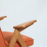 Fauteuil scandinave orange brûlée conclu par Chierowski