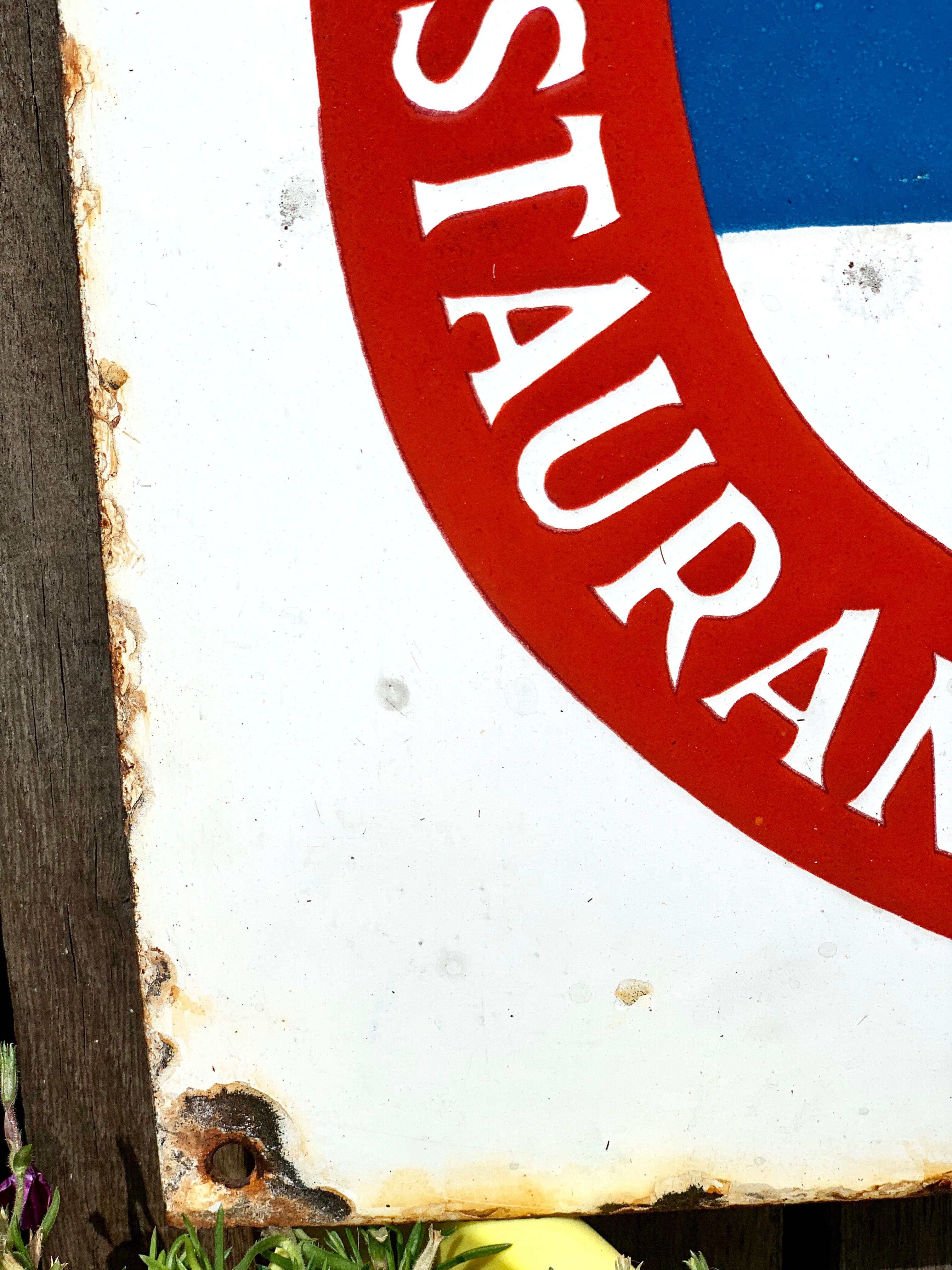 Old enamelled plate tourist restaurant