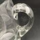 Glass jug with chiseled pattern