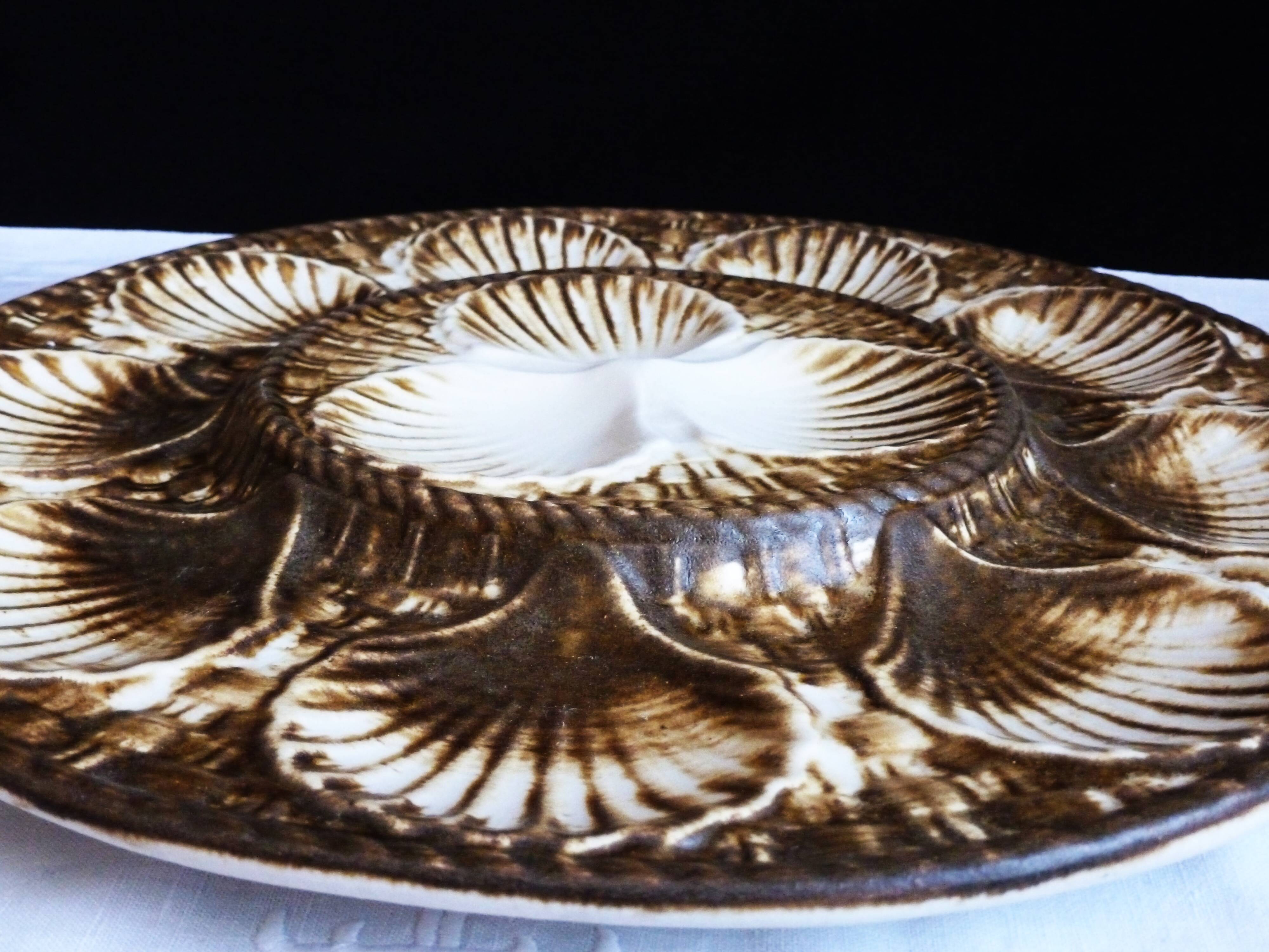 Oyster service, platter and 6 Longchamp oyster plates.