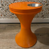Orange tam-tam by Stamp with integrated pocket.