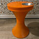 Orange tam-tam by Stamp with integrated pocket.