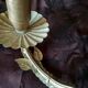 White glazed metal wall light with leaf and flower decor, 2 lights