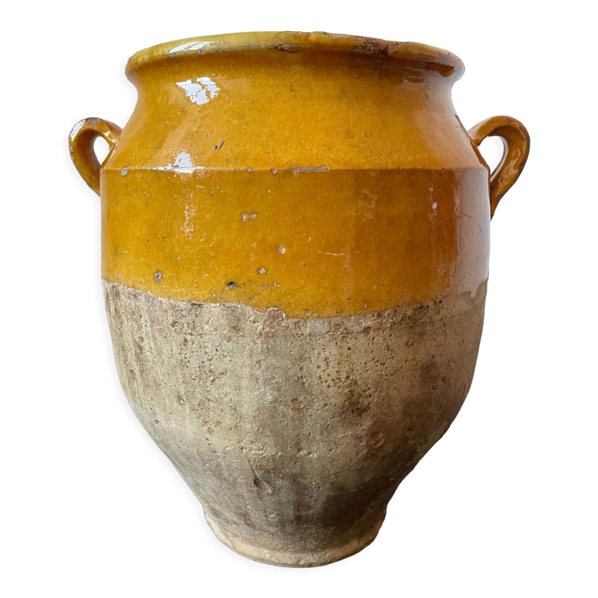 Old yellow glazed terracotta grease pot south west France