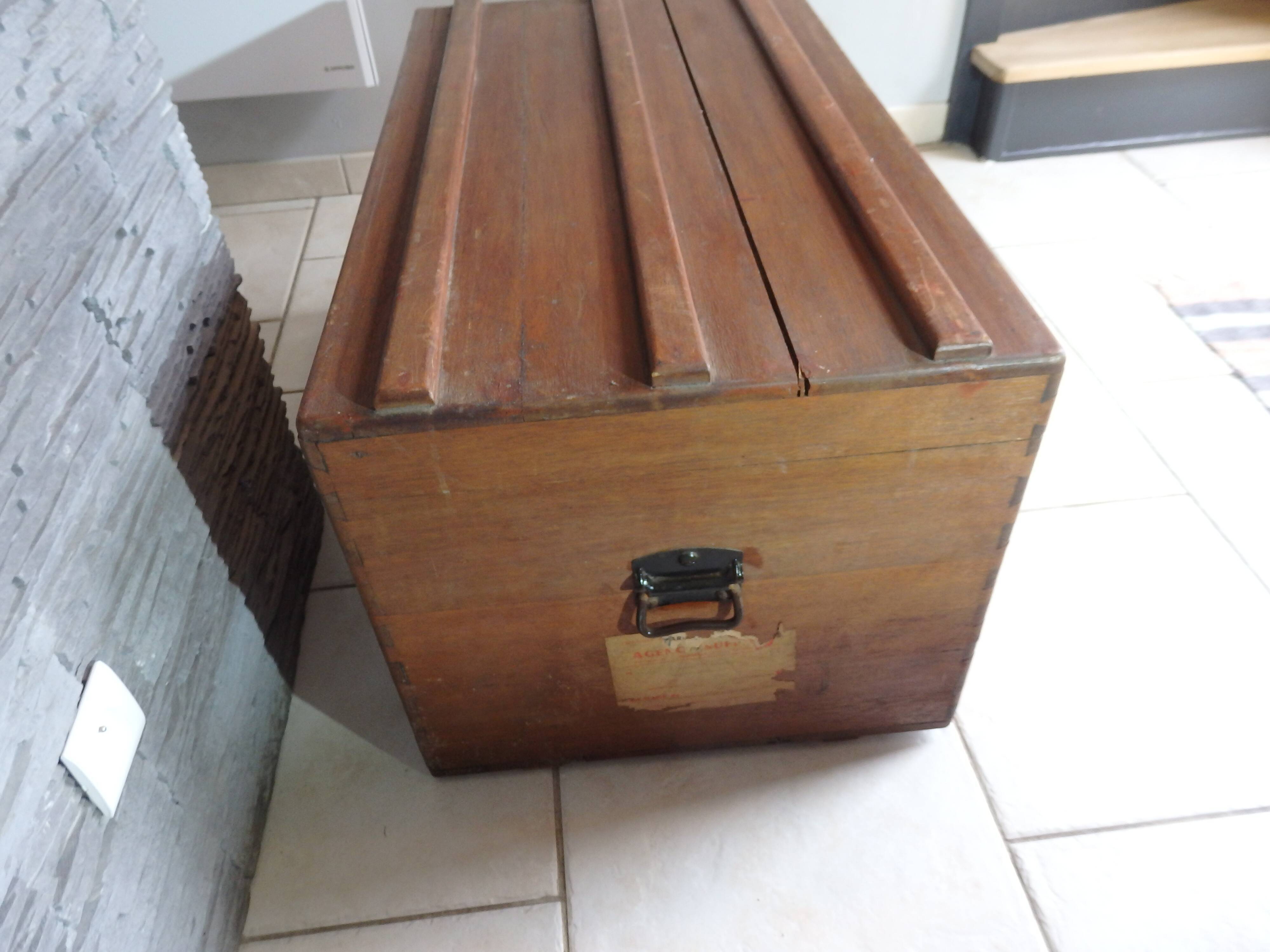 Old military travel trunk with oak key and label