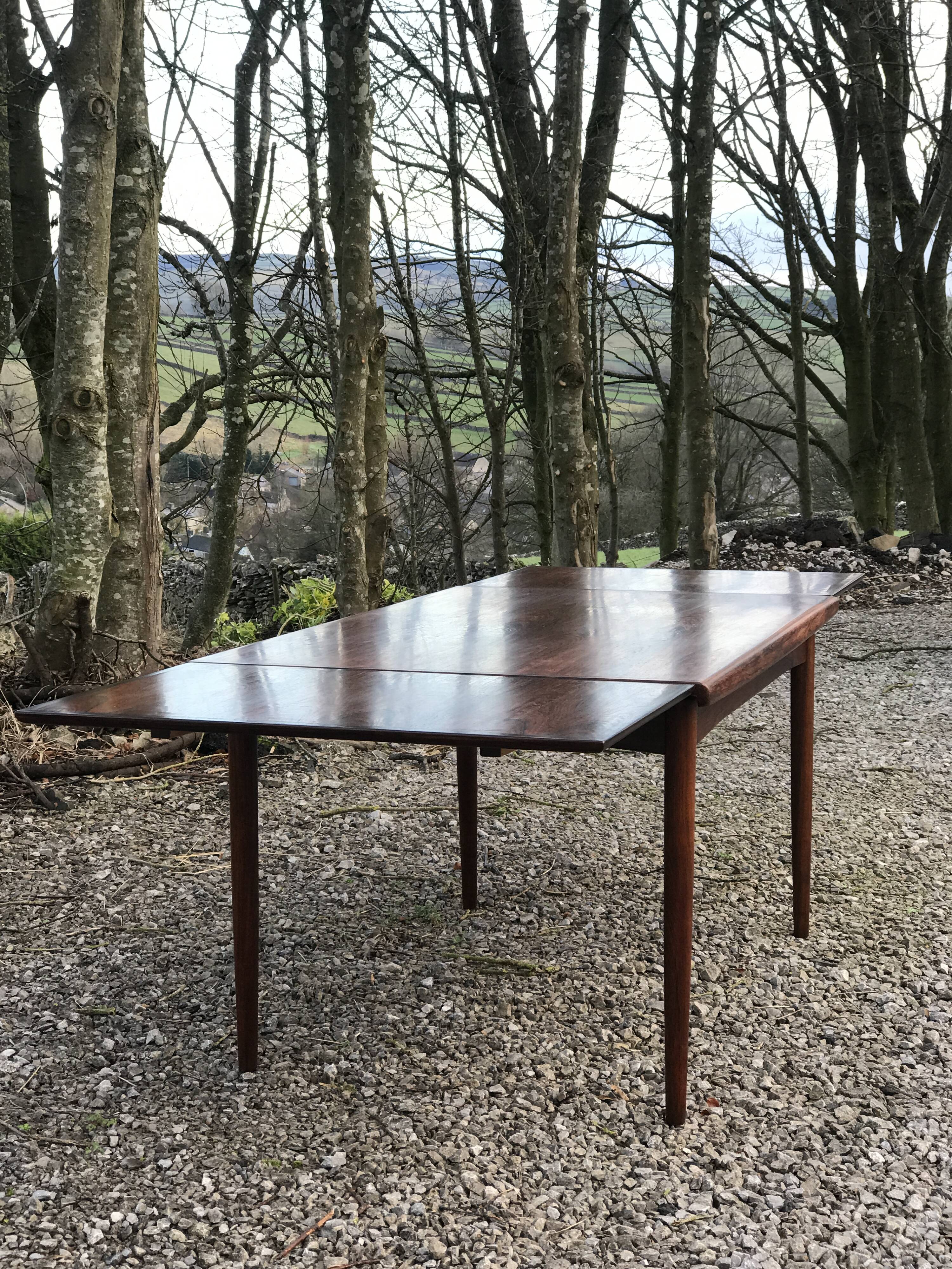 Mid-century danish rosewood extending table.