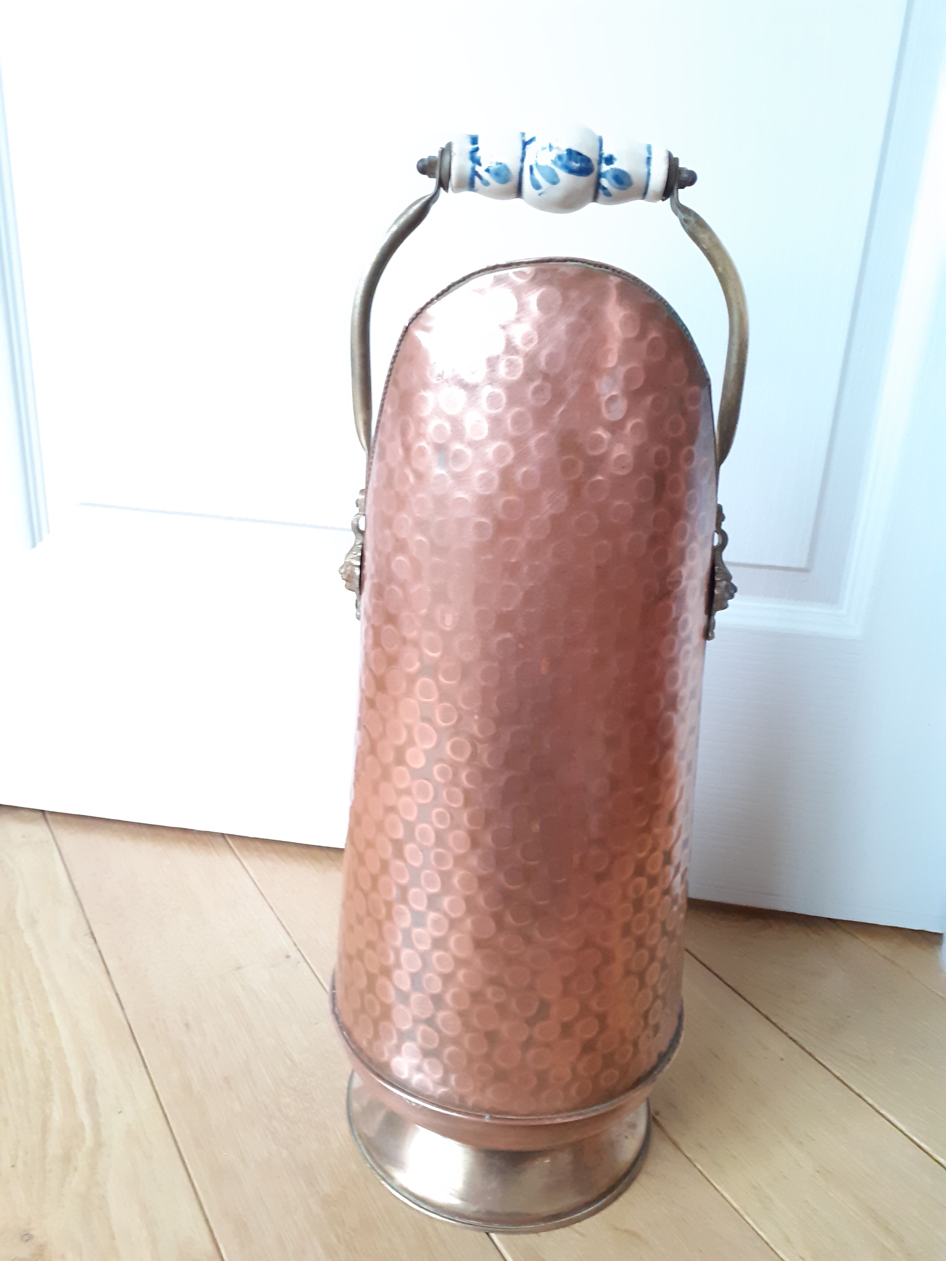 Old coal bucket made of copper and brass