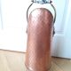 Old coal bucket made of copper and brass