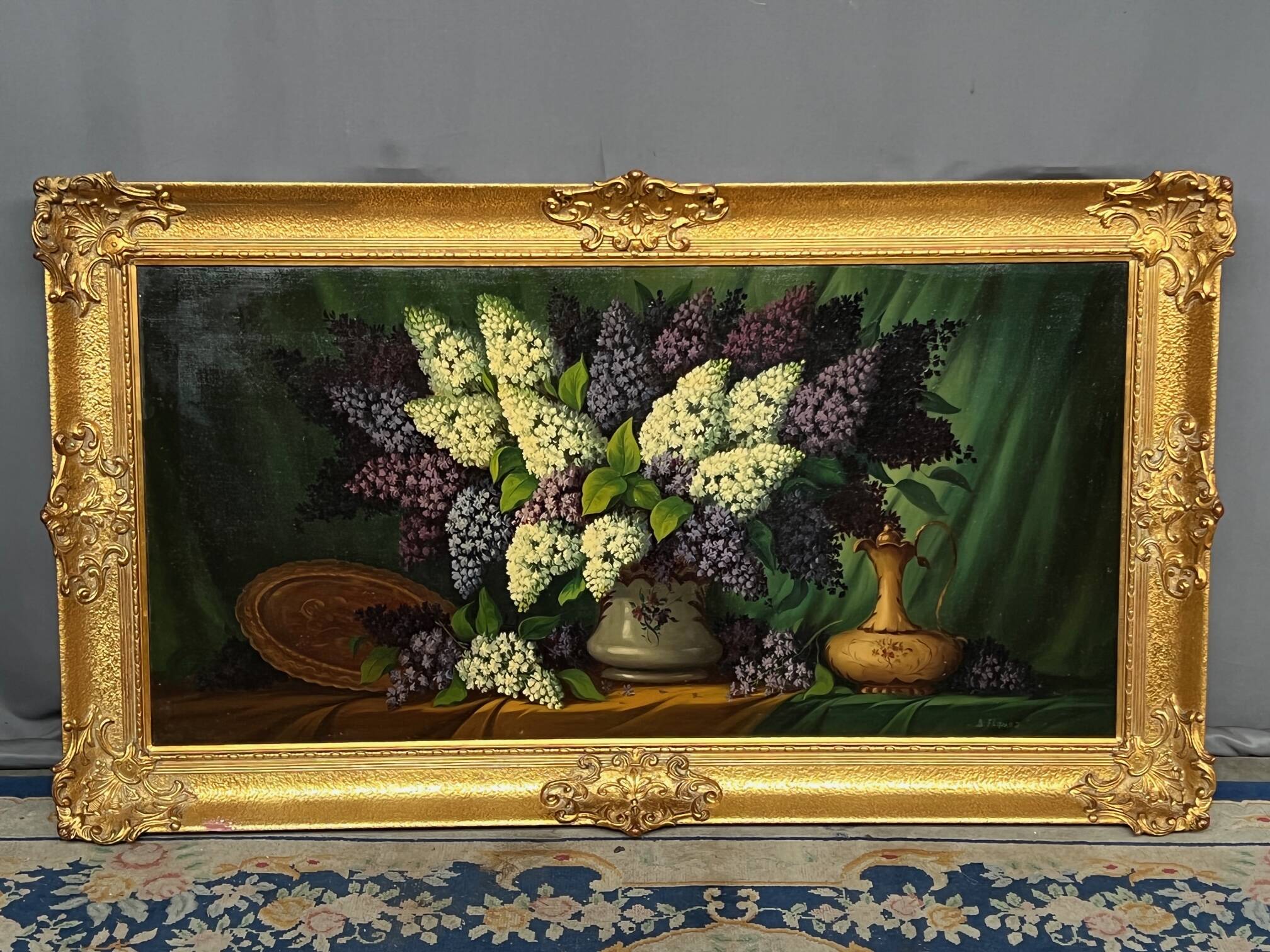 Painting signed "Still life with lilacs".