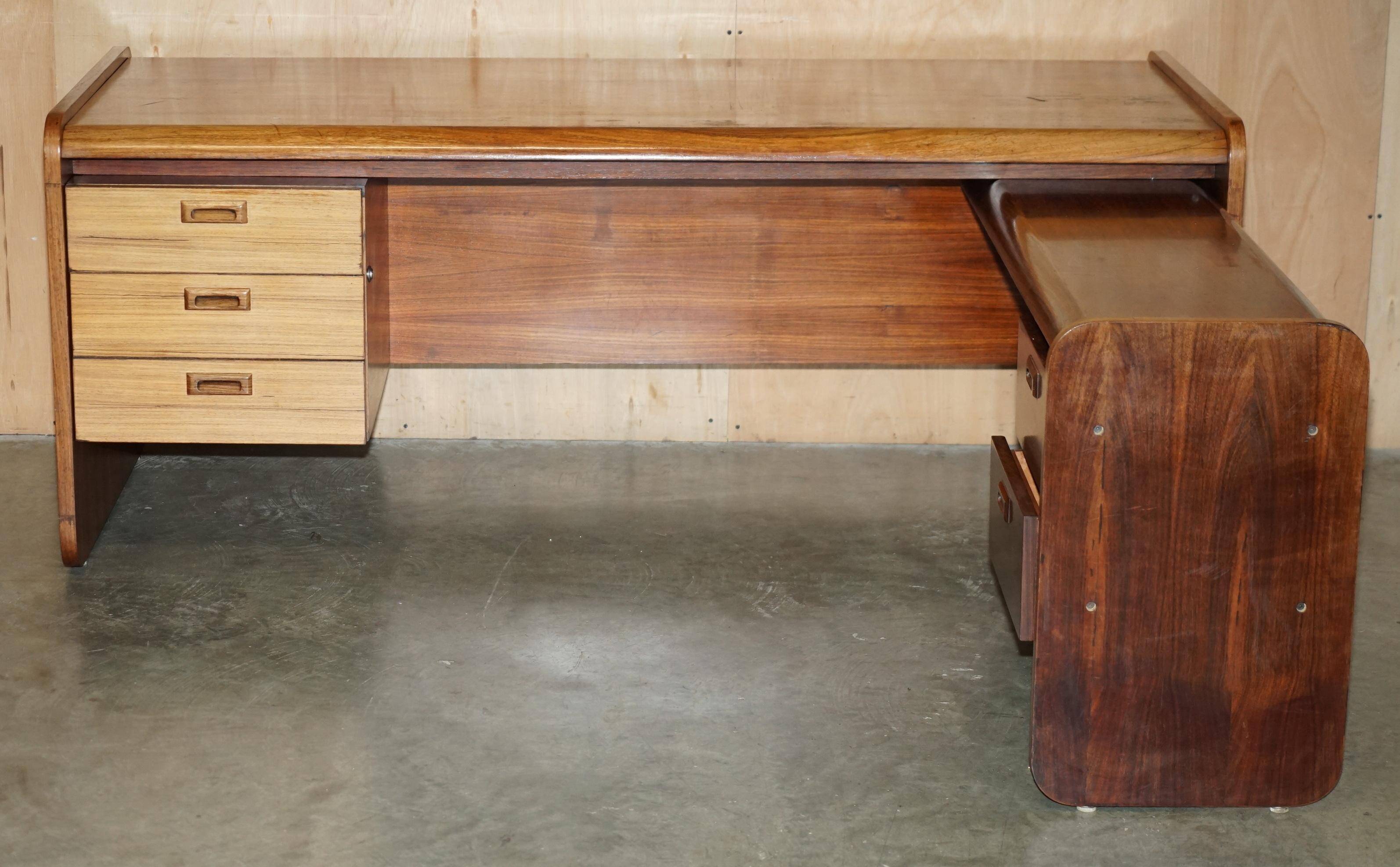 Mid-century modern right-angle desk in Brazilian wood.