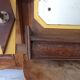 Vintage Art Deco wall coat rack in two-tone wood with engraved mirror.