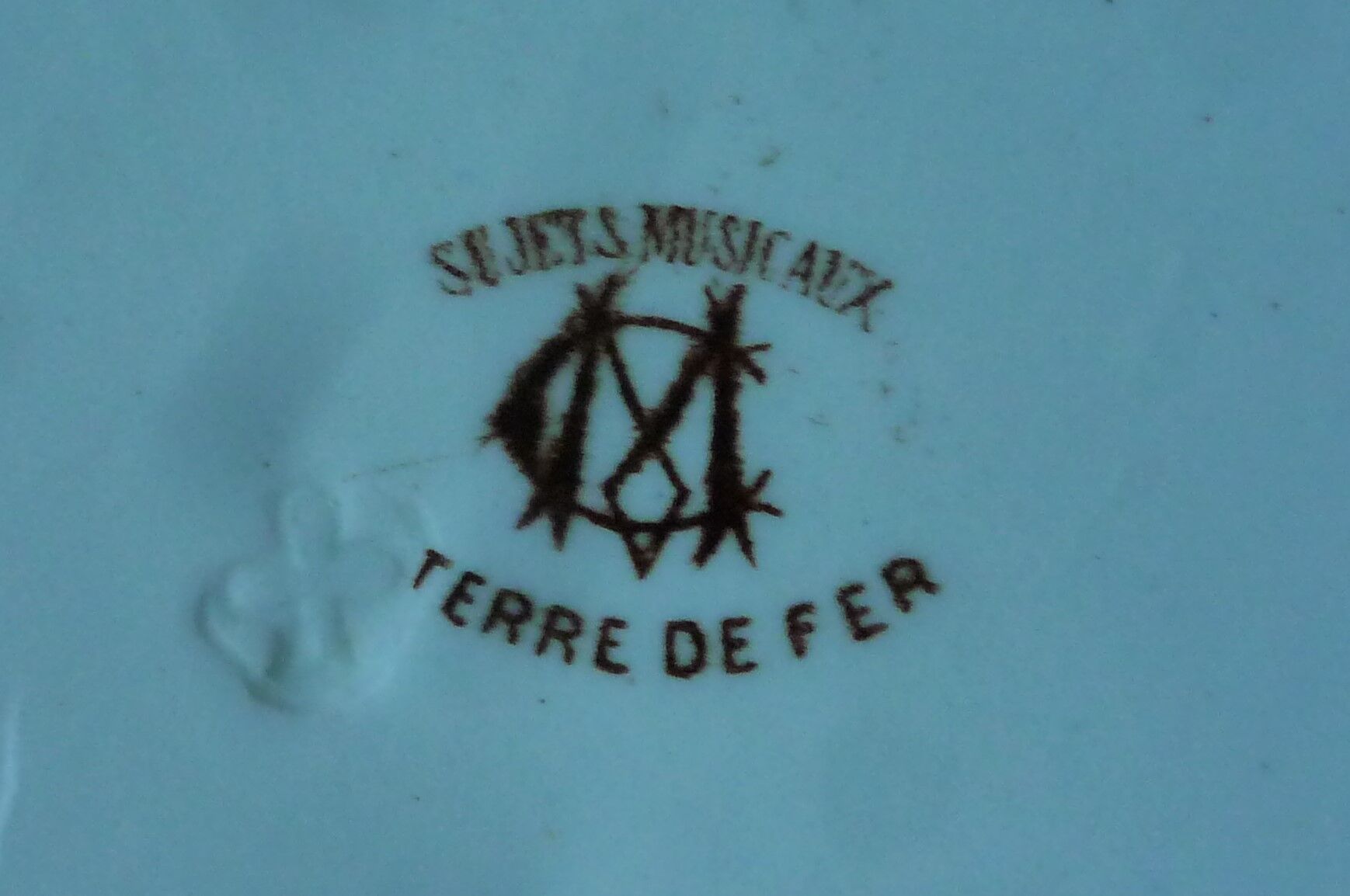 Pair of old plates Terre de Fer / Creil and Montereau, musical subjects