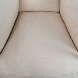 Art Nouveau design armchair with a luxurious light fabric upholstery