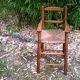 High wooden child chair, straw seating
