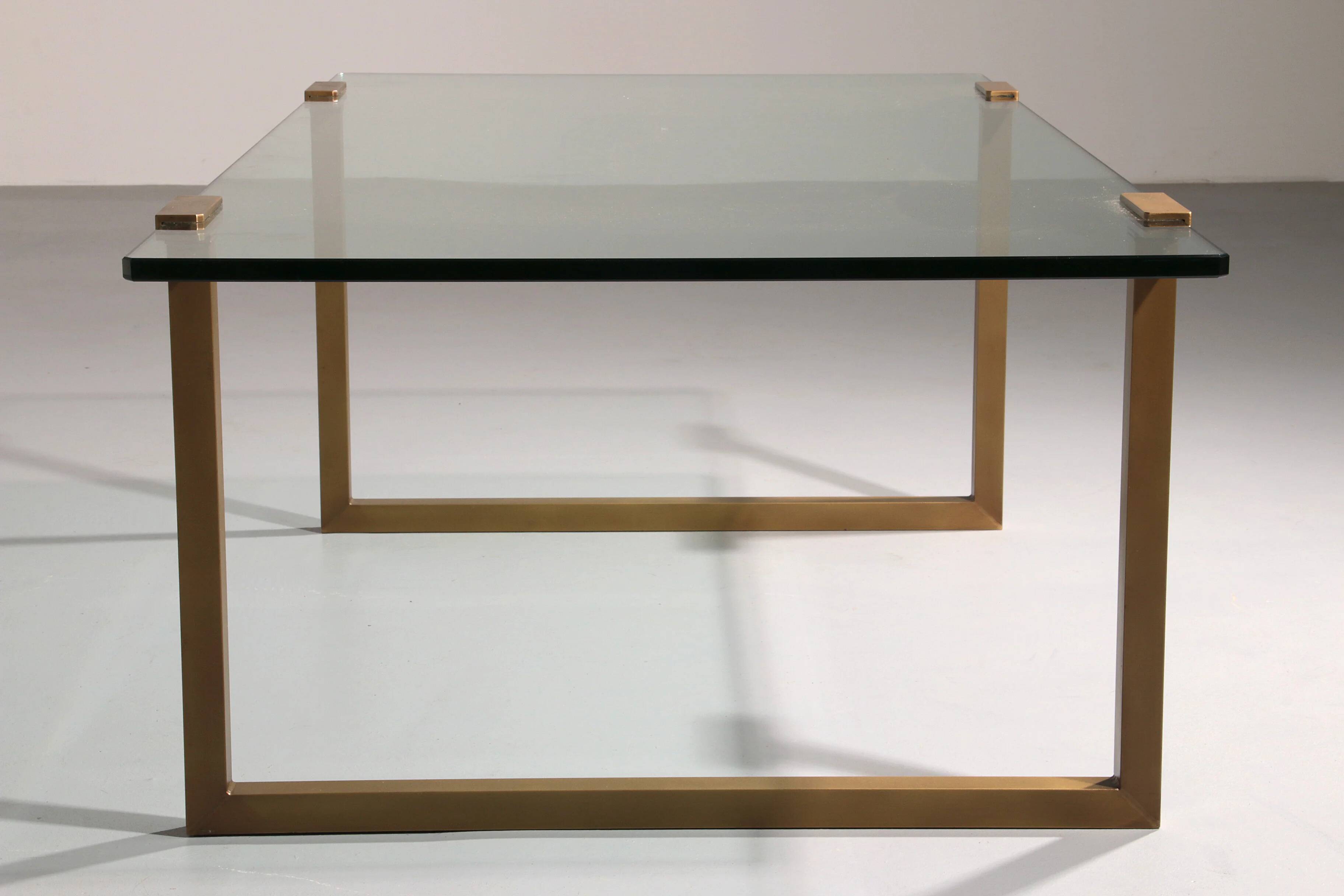 Coffee table glass and brass by Peter Ghyczy model T54 1970