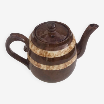 A brown England teapot