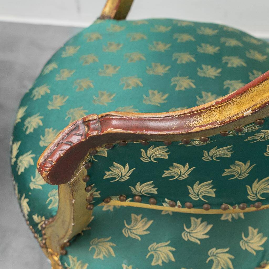 Pair of Louis XV style gilded armchairs with vintage green fabric