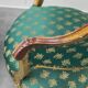 Pair of Louis XV style gilded armchairs with vintage green fabric