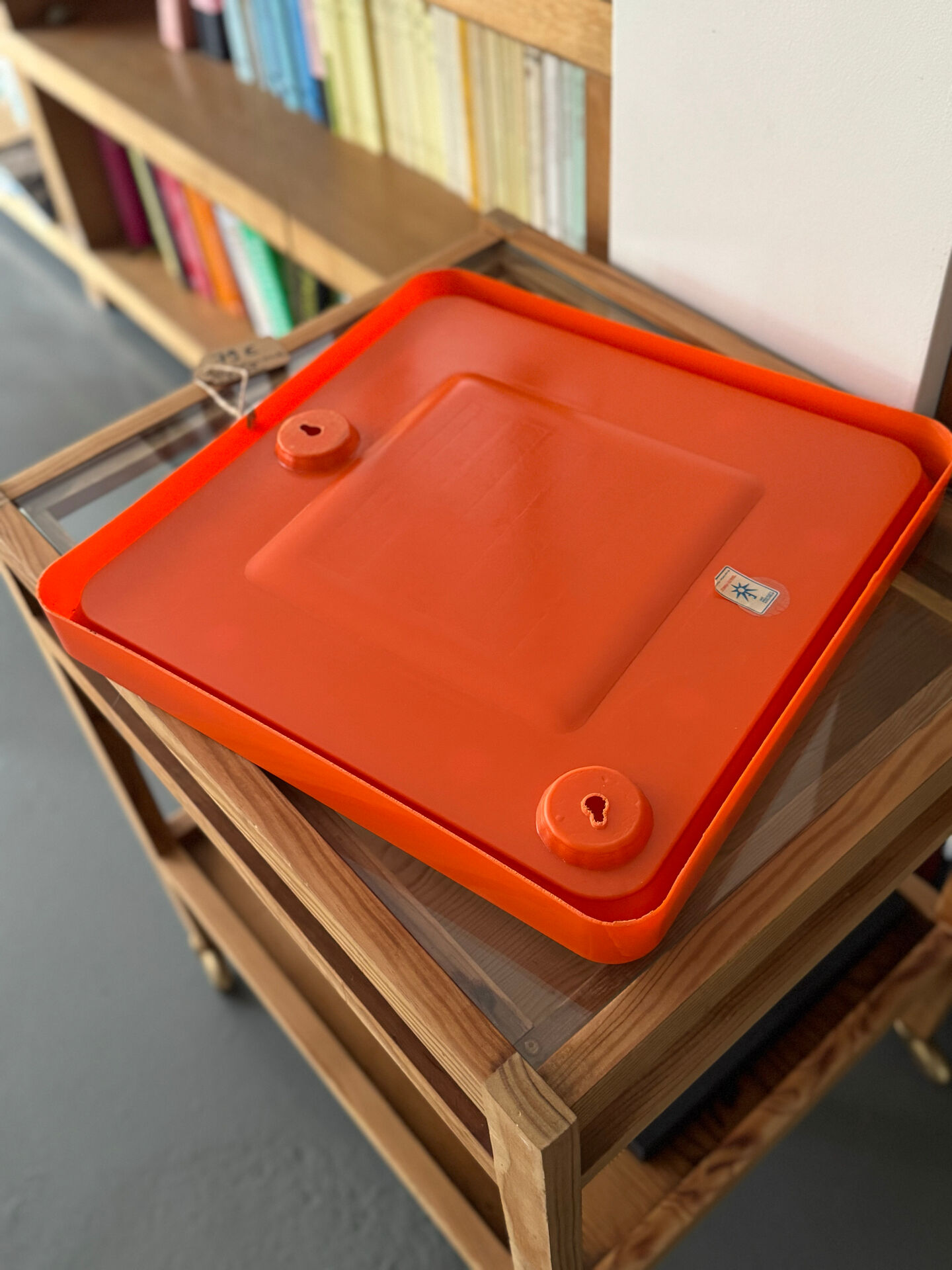 Orange moulded plastic mirror