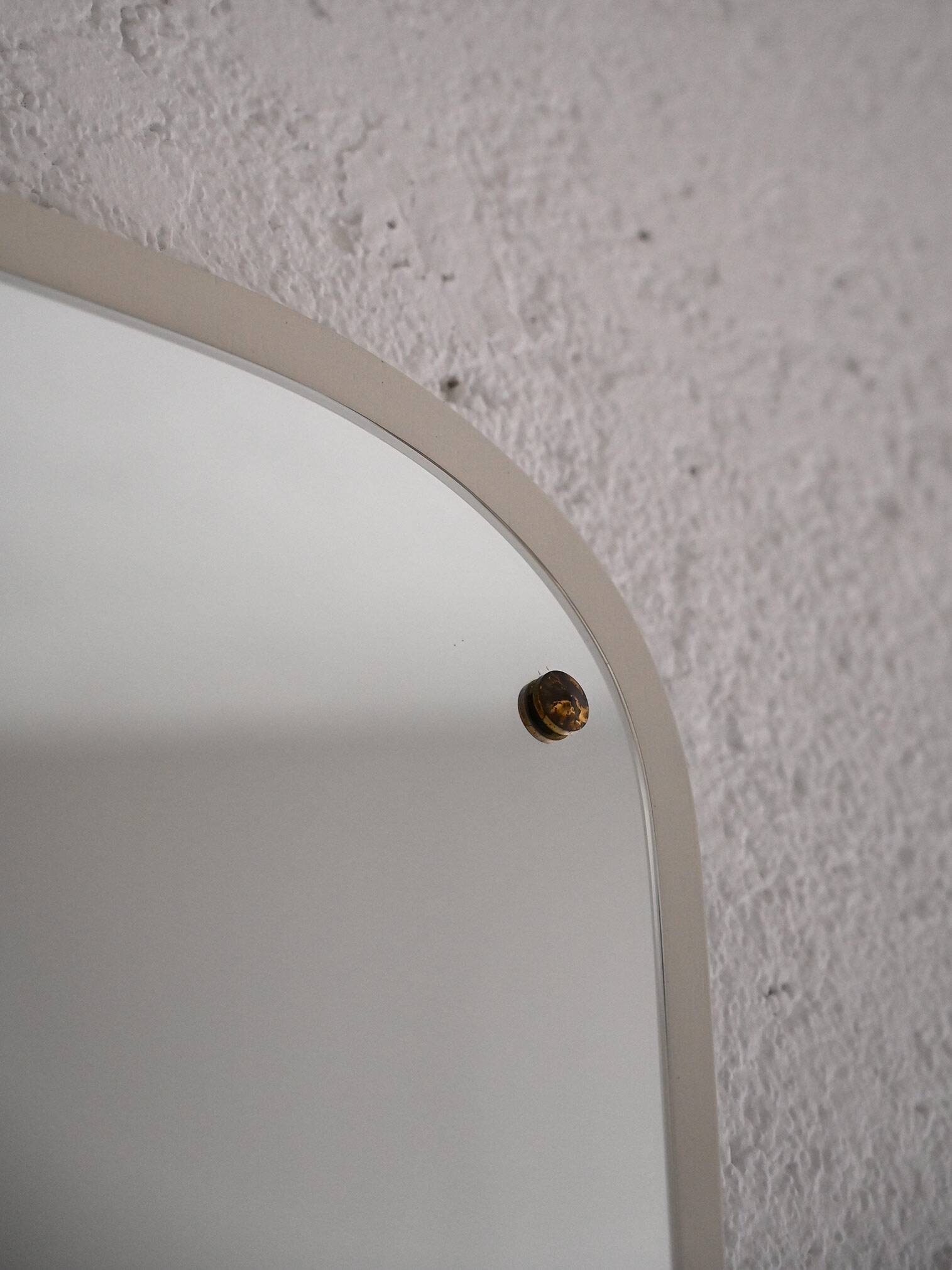 Decorative mirror with white painted wooden frame and gold details