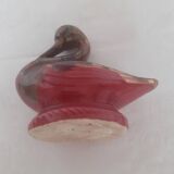 Old piggy bank to break in the shape of a swan