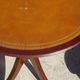 Small side table with an oval top in English style.