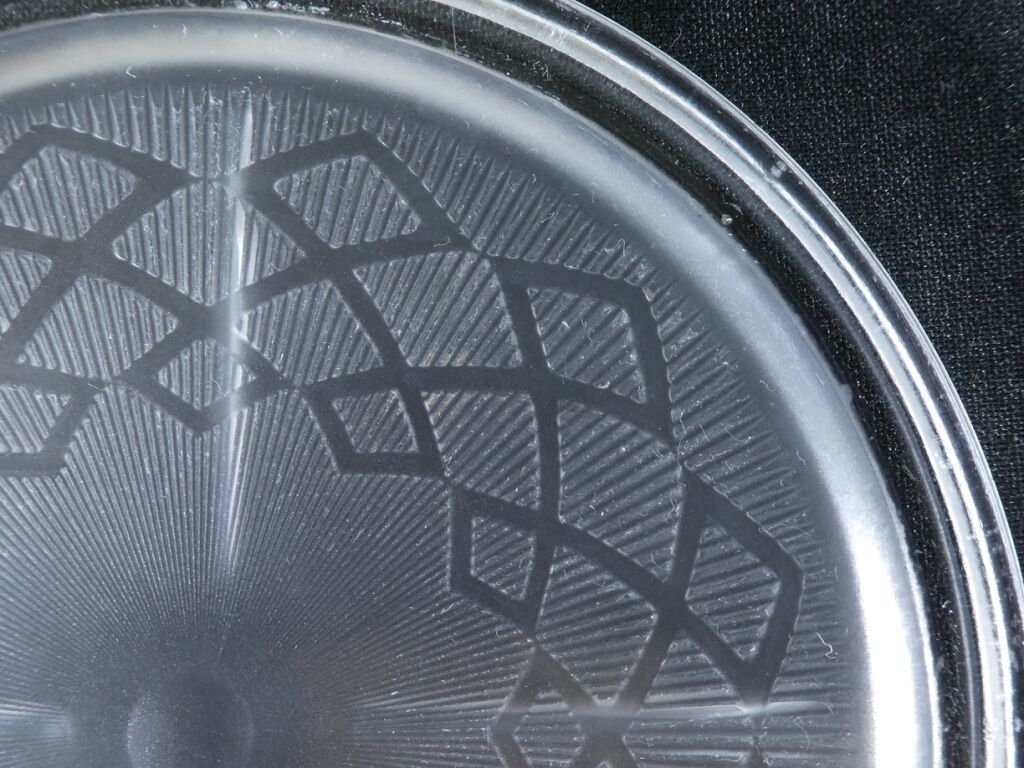 Pair of pressed moulded glass bottles mats