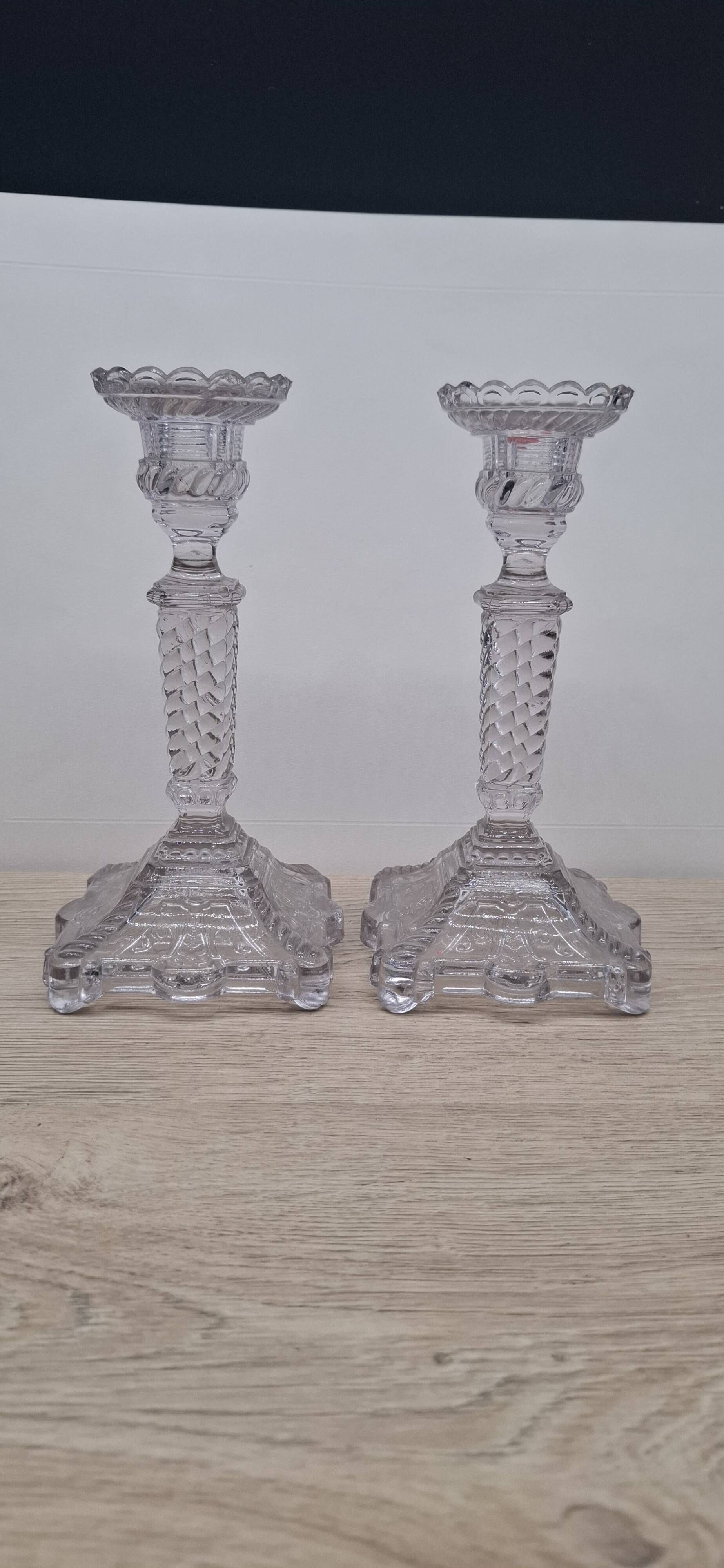 Pair of molded glass candlesticks
