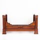 Bed made of solid walnut with marquetry details. France, 1930s.