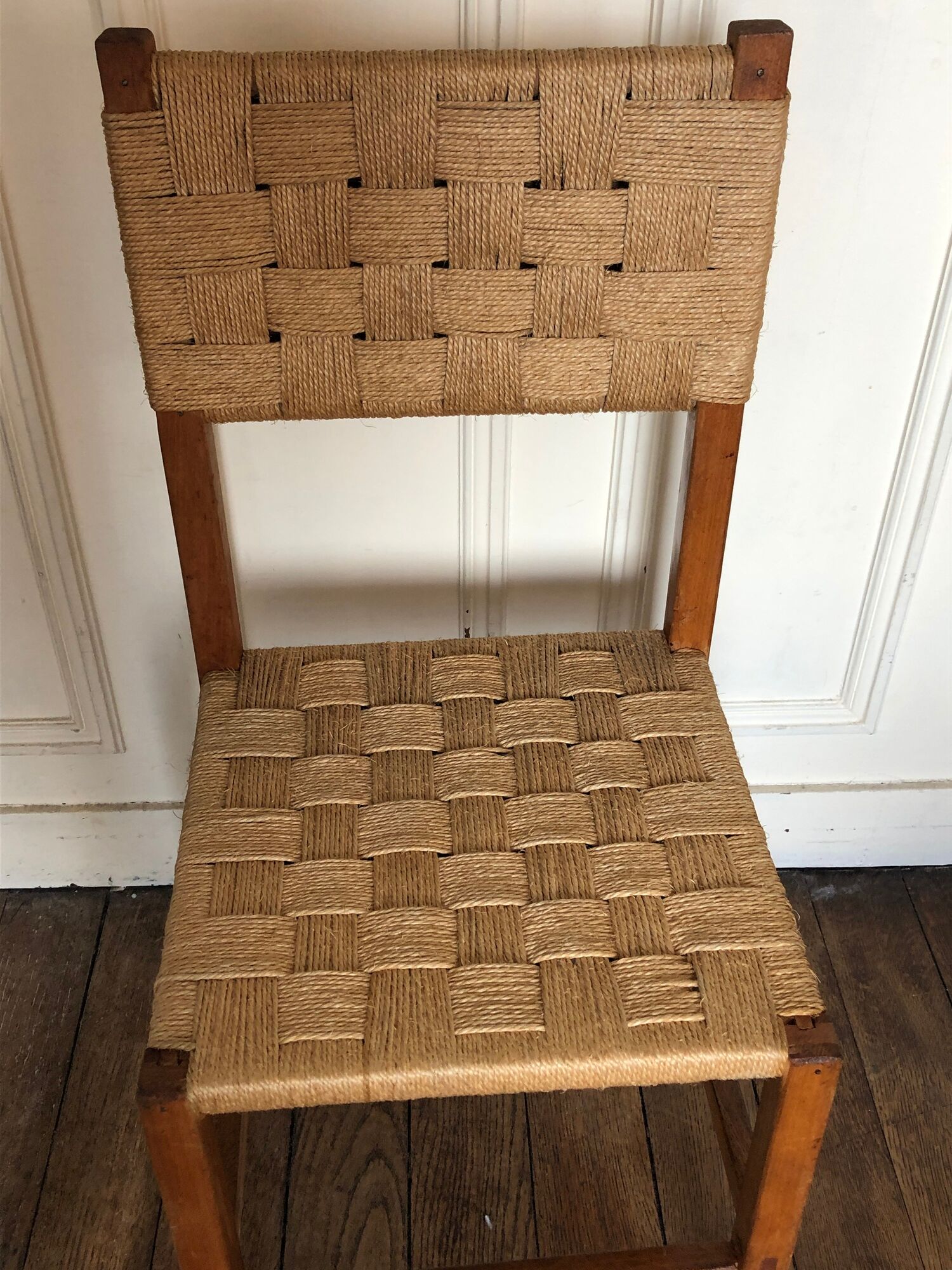 Chair made of wood and rope