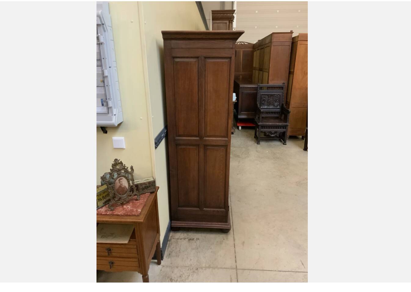 Antique neo-Gothic wardrobe with linen drawers.