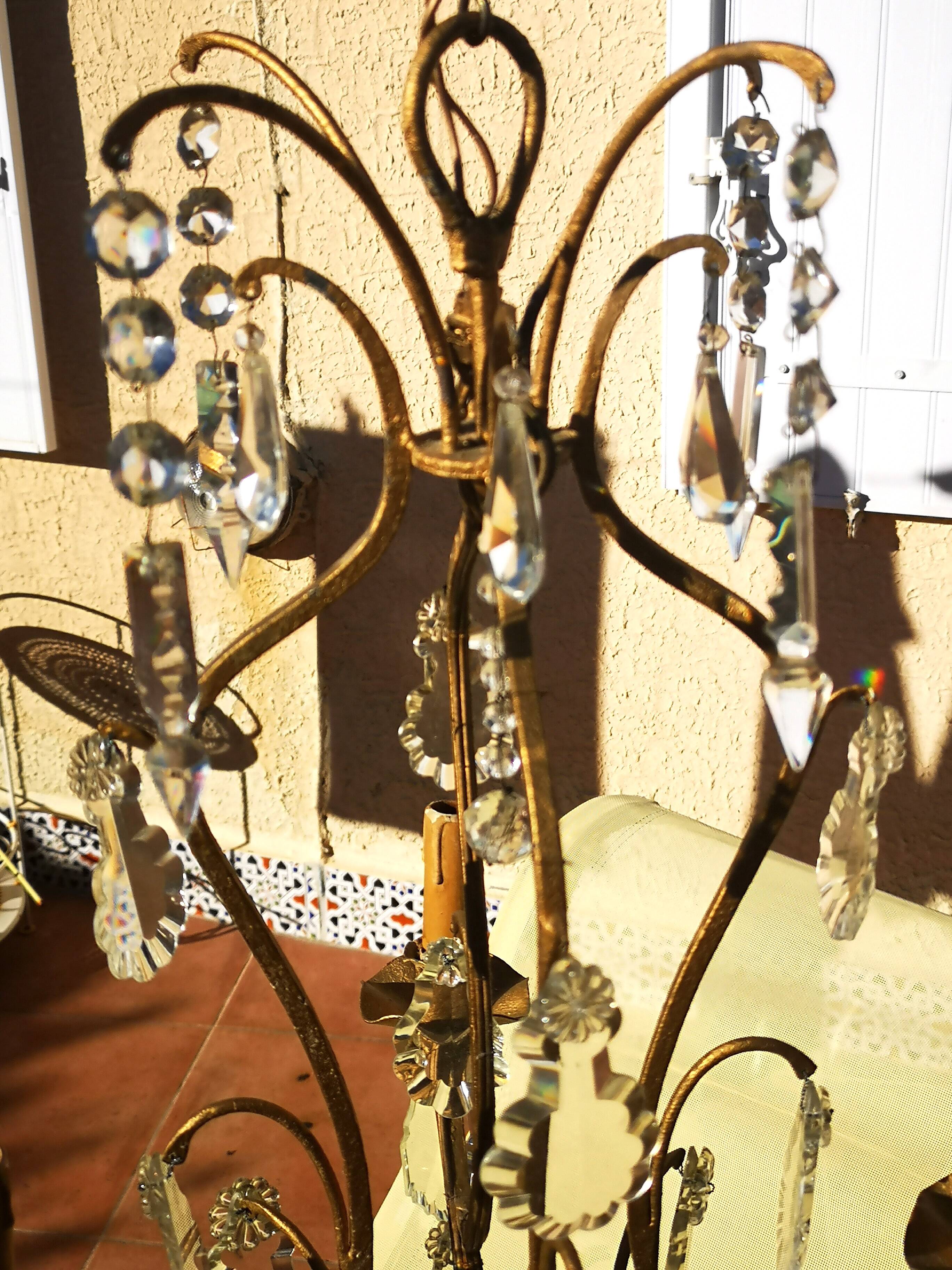 Wrought iron chandelier with pendants