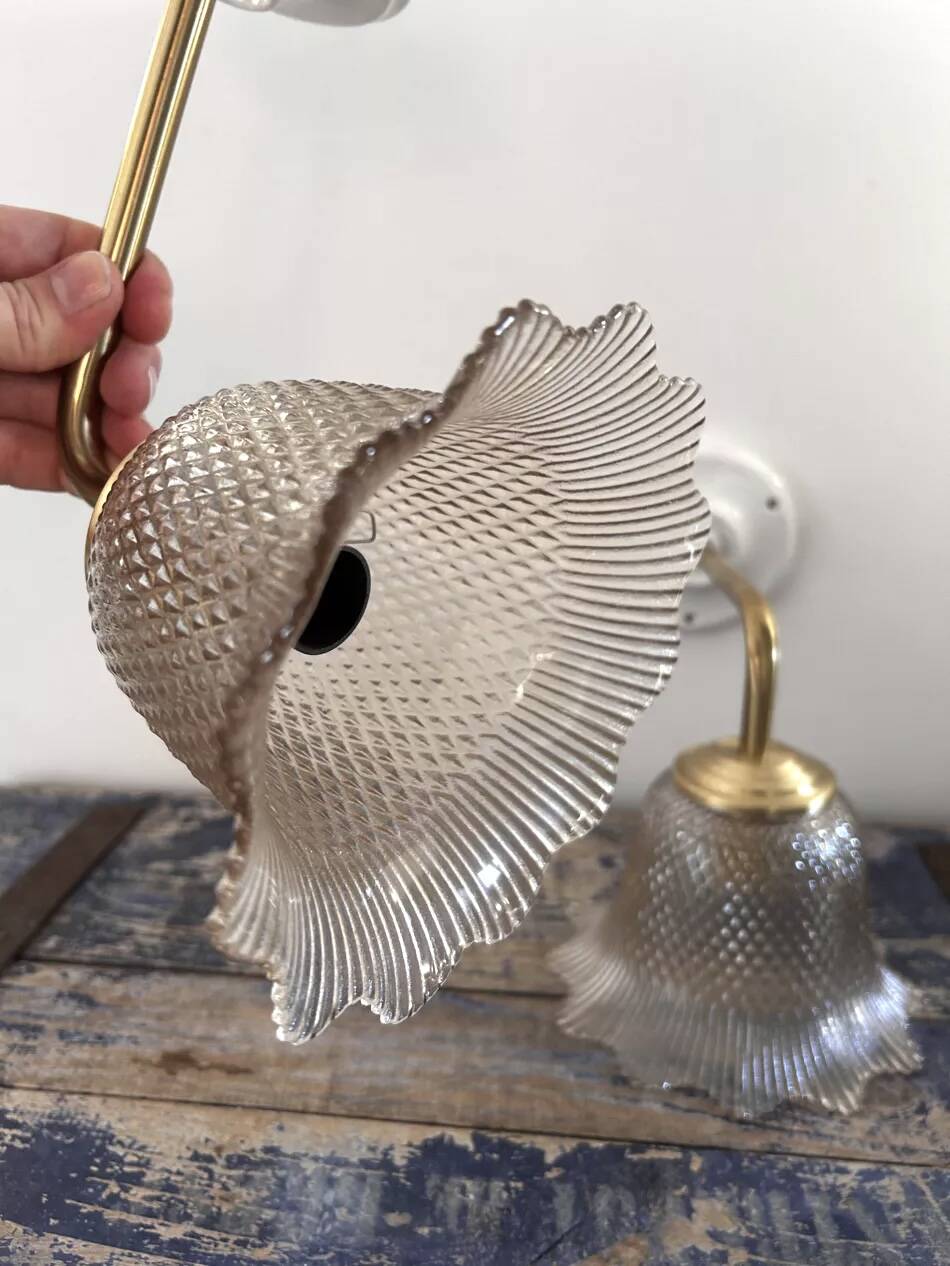 Pair of gold wall sconces