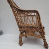 child's or doll's armchair in light woven wicker