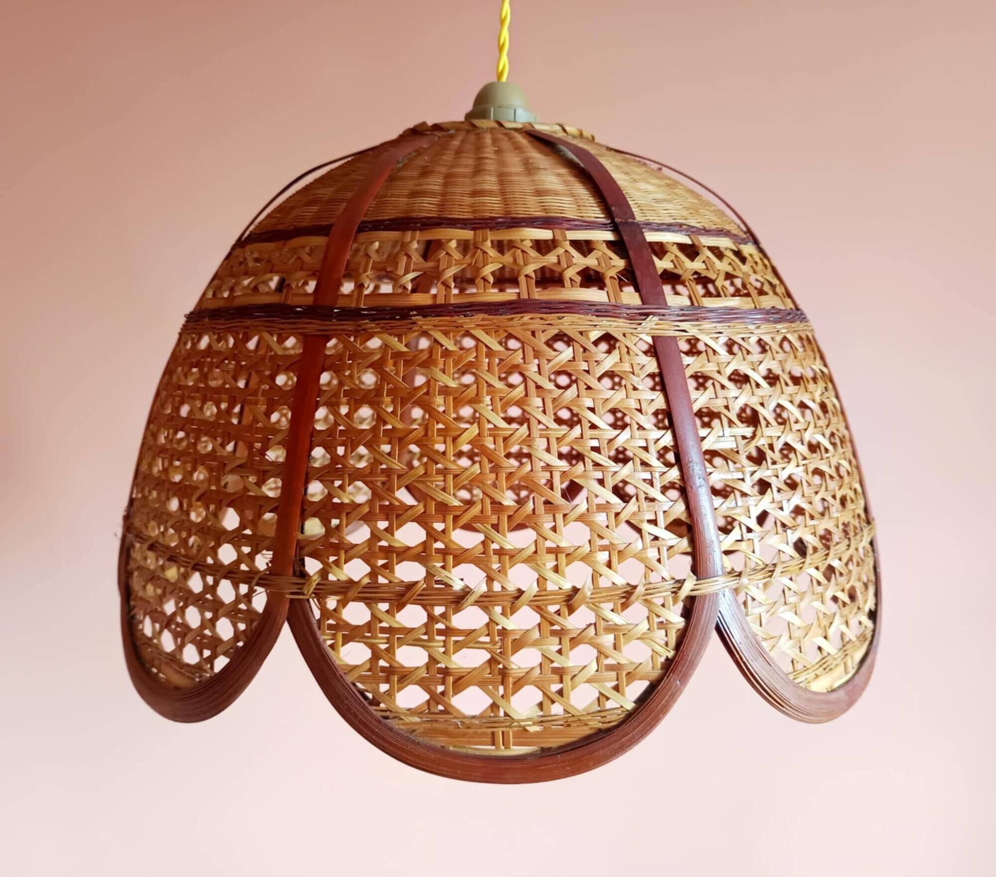 Large cane and rattan vintage bohemian suspension from the 1970s.