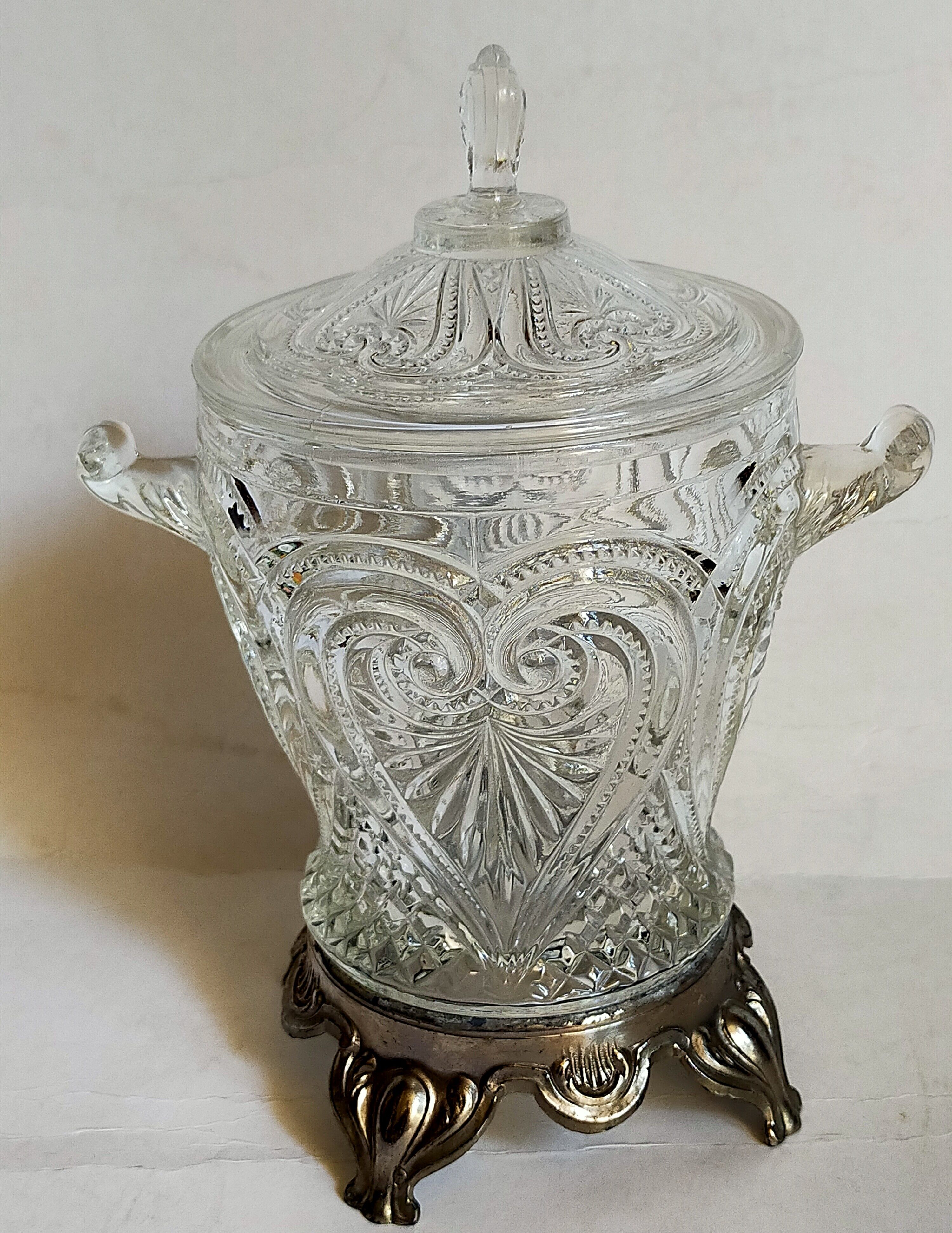 Antique glass compotier on metal stand