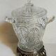 Antique glass compotier on metal stand