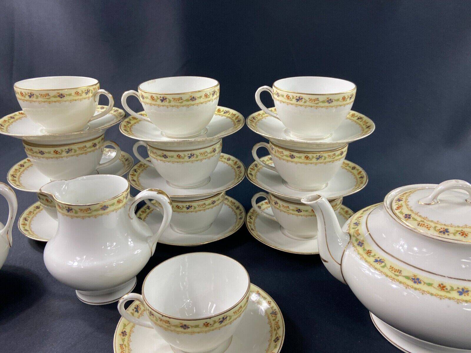 Limoges porcelain tea set Bernardaud Teapot sugar bowl milk pot cups