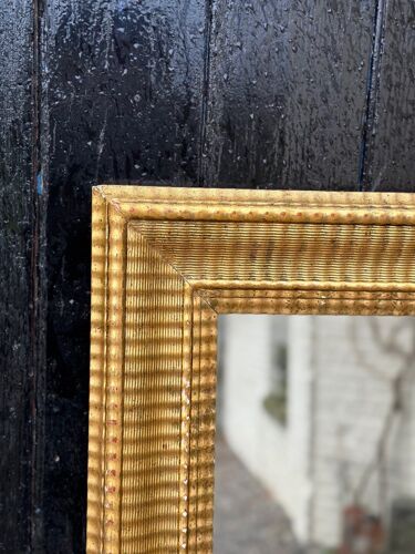 Miroir en bois stuqué et doré vers 1880 88x142cm