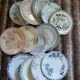 13 mismatched flat plates in ironstone