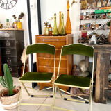 Pair of vintage green velvet folding chairs