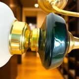 Brass wall sconce with frosted glass tulip lampshade
