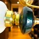 Brass wall sconce with frosted glass tulip lampshade