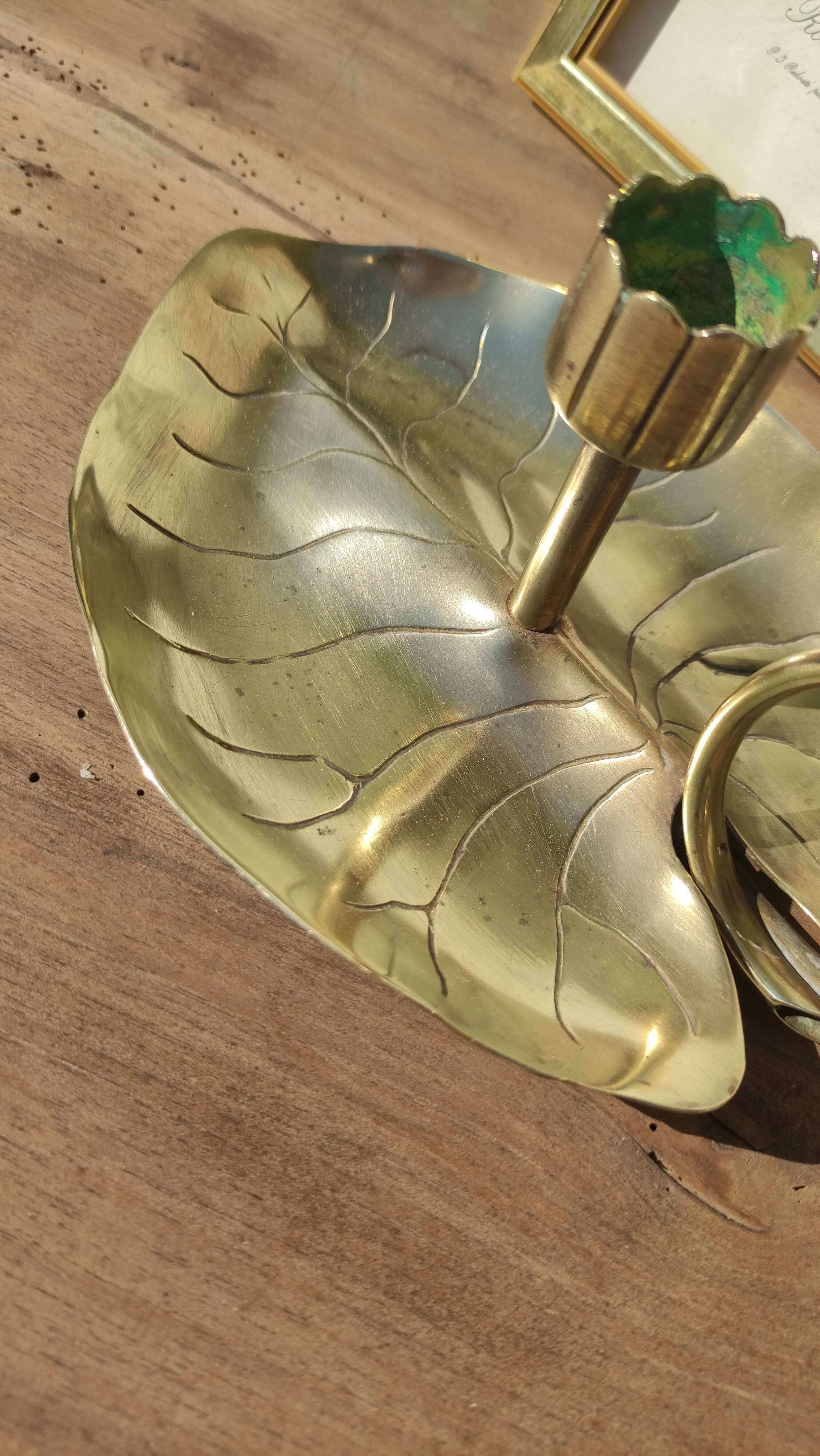 Vintage candle holder in golden brass