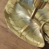 Vintage candle holder in golden brass