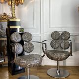 Pair of italian swivel armchairs in chrome-plated metal and piton imitation fabrics