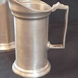 Set of 3 pewter pitchers 95%