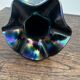 Vintage iridescent glass vase with ribbed design and ruffled neck, H 21 cm.