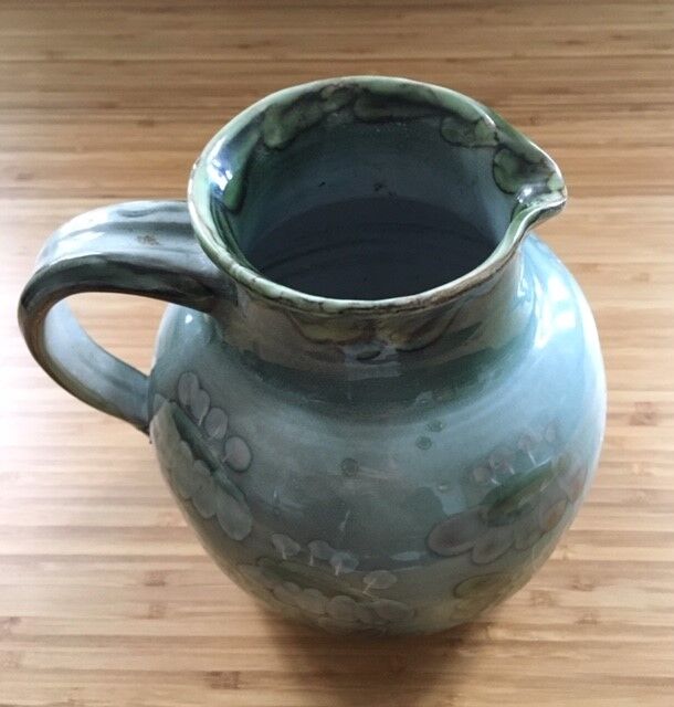 Grey-blue pitcher with floral decoration